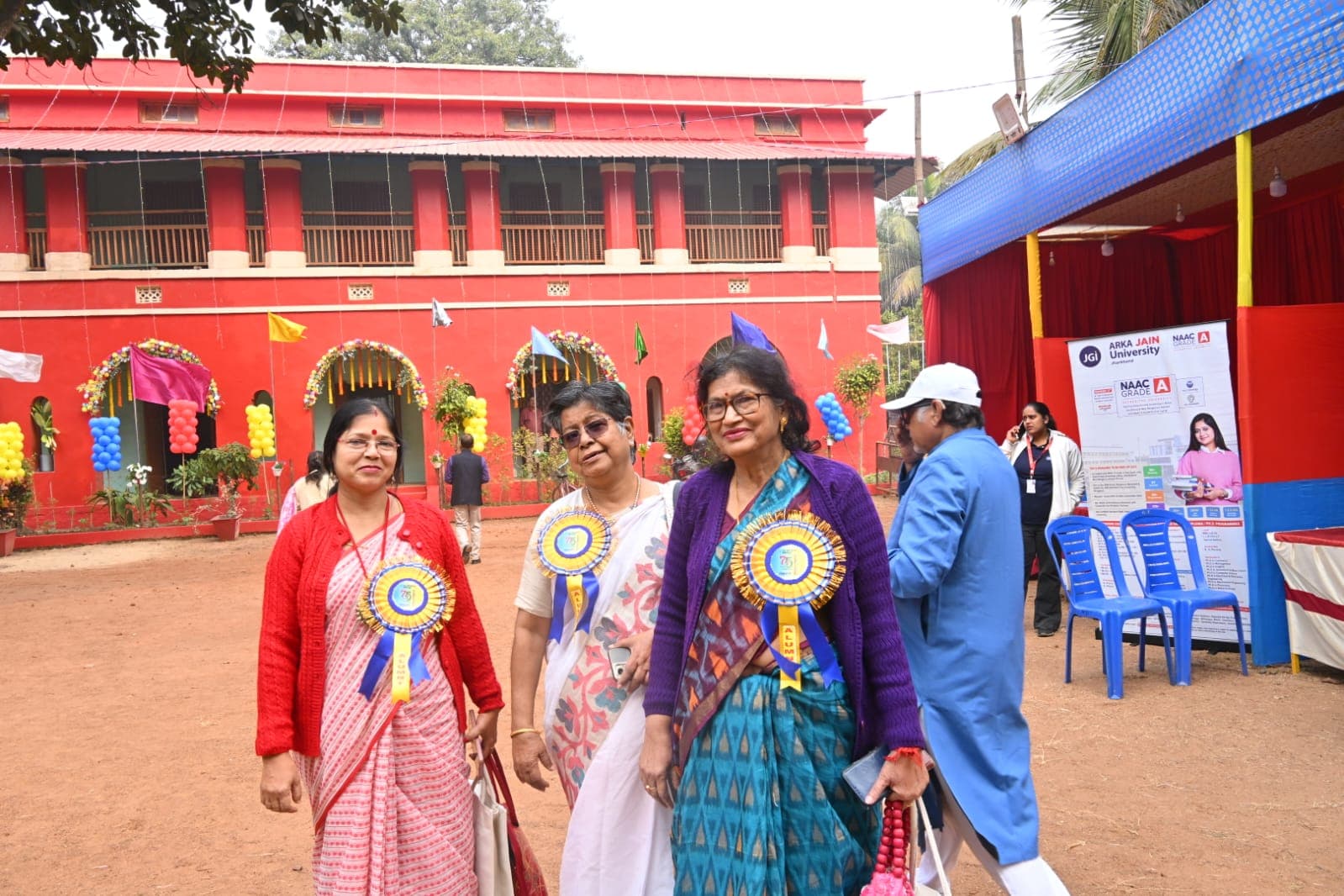 75th Foundation Day rally with school banner