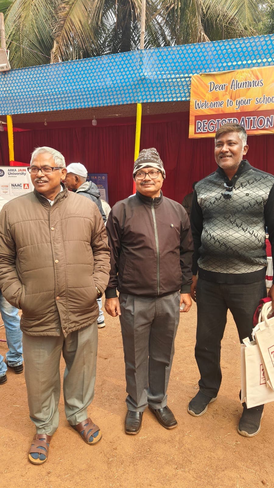 Alumni at the registration desk during the reunion