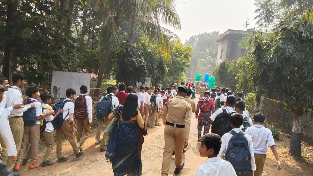 NCC cadets and students marching together