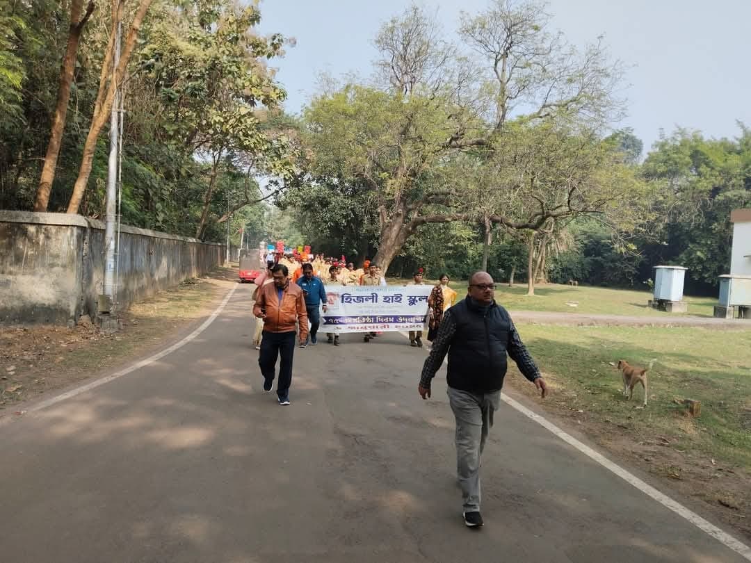 Students and staff in rally on the campus road